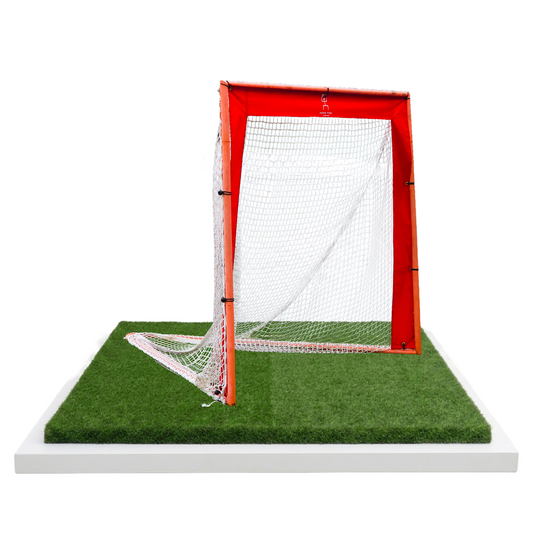 Angled view of lacrosse goal with red frame and Hang Time Lacrosse logo, ready for Pipe Stripes 3-Panel targets