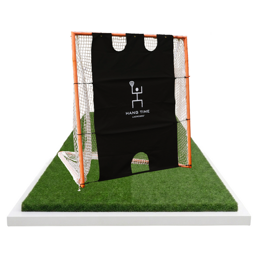 Pipe Painter Goal Blocker on a lacrosse goal, angled view showing canvas coverage and scoring cutouts